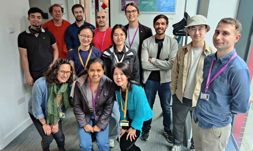 A group of people posing for the camera