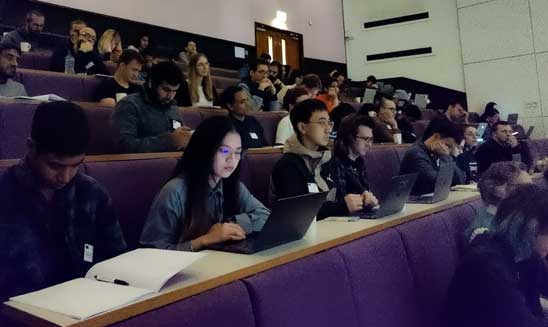 students seated in a lecture theatre